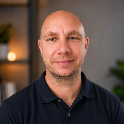 Mariusz Baran, founder and owner of Probate Clearance London, wearing a navy polo shirt